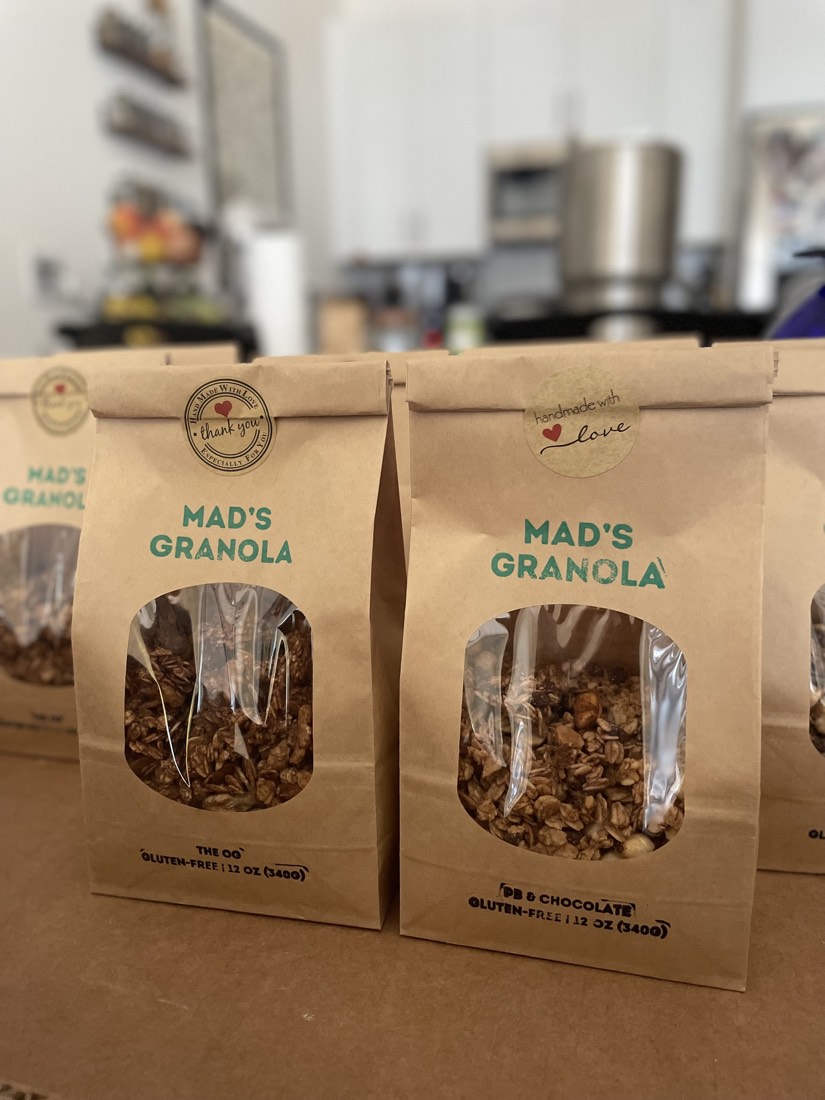Two bags of Mad's Granola, one of each flavor